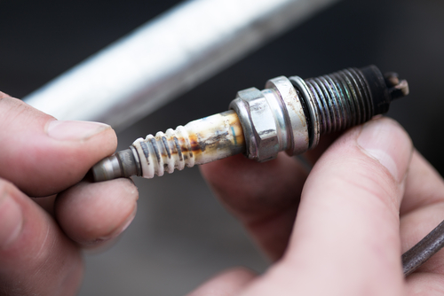 unscrew the spark plugs