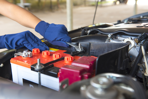 how to load and check a new car battery