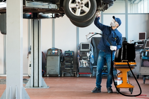 Non-abrasive blasting of underseal
