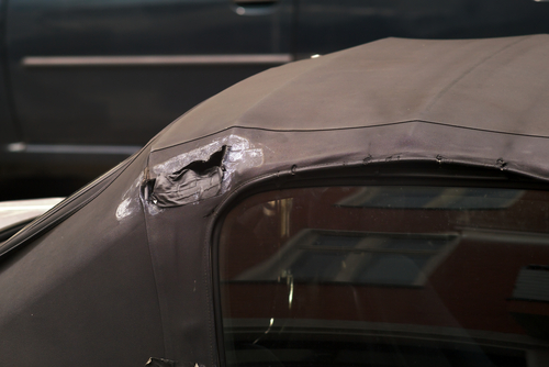 Repairing holes of a convertible top
