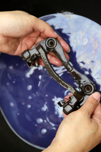 rinse brake caliper with brake cleaner