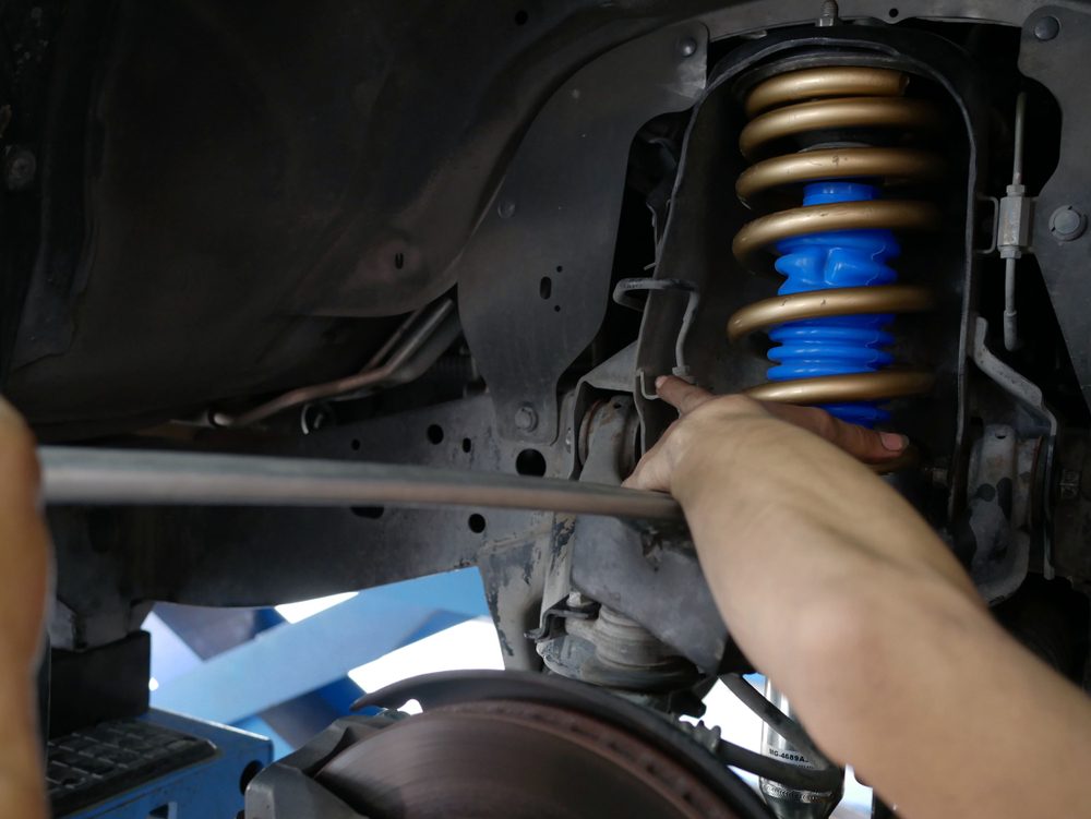 how to disengage the shock absorber from the wheel
