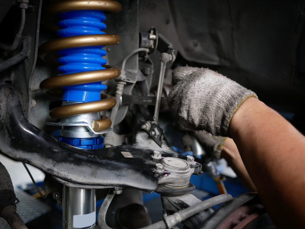how to disengage connected components around shock absorber