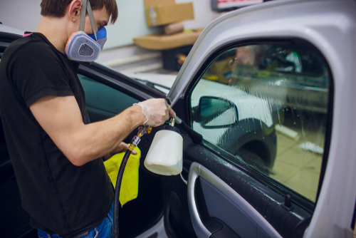 Cleaning car windows on the inside
