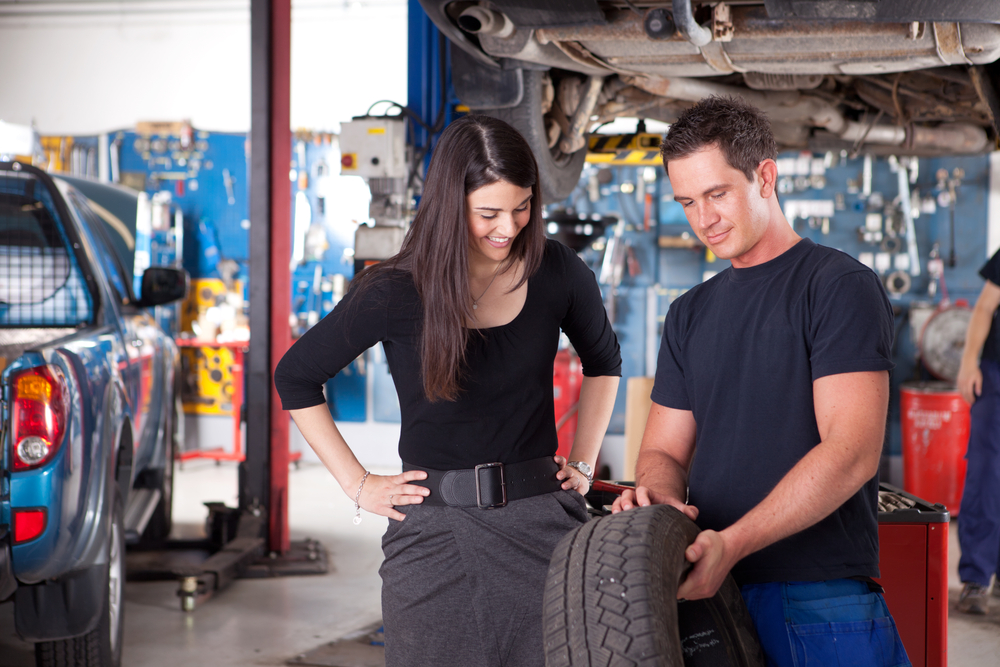 Checking car tyres at the specialised workshop