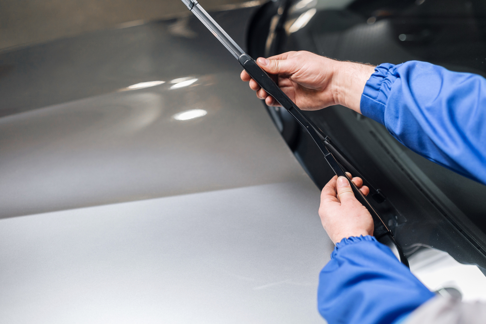 Windscreen wiper hook mounting