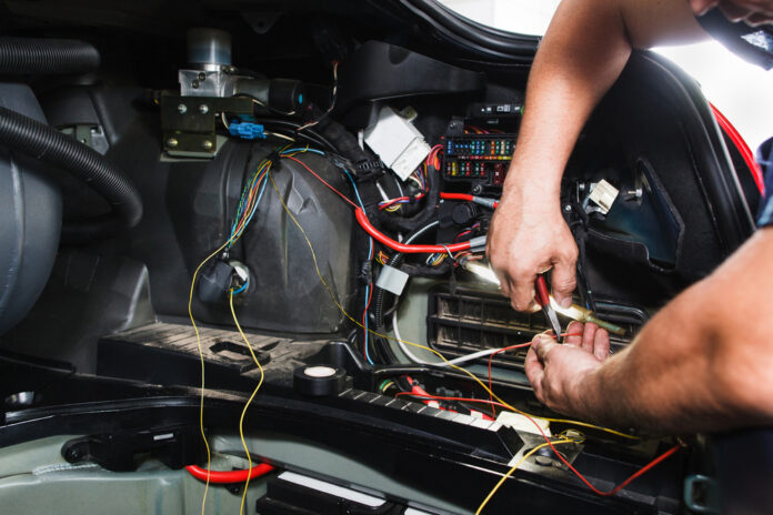 Laying the wiring harness in the car - a real pain in the neck
