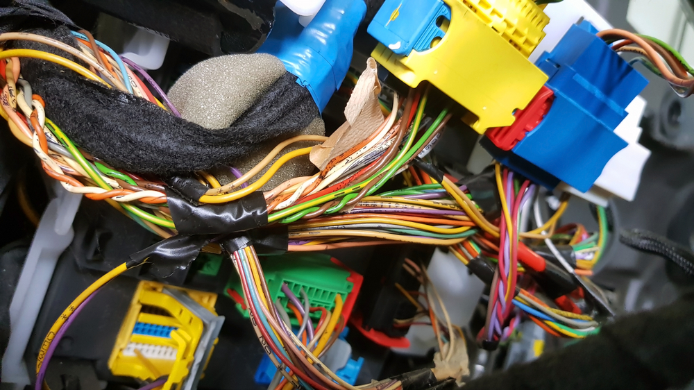 When should a wiring harness be rewired
